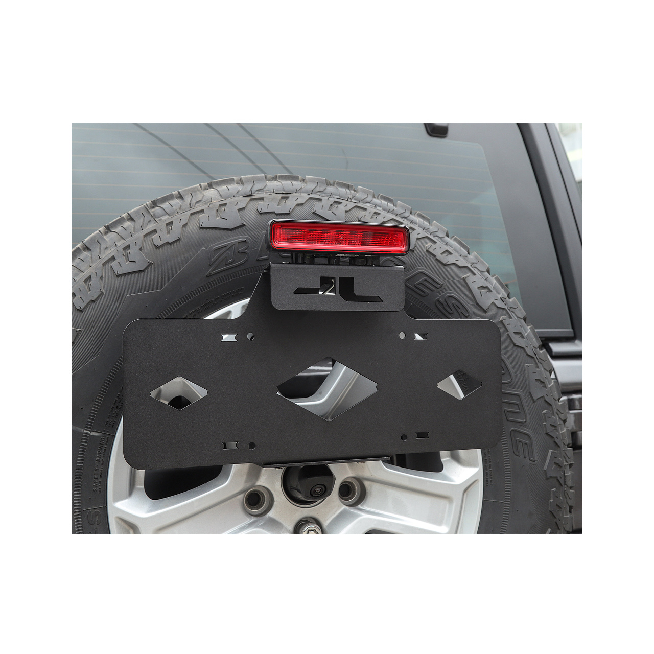 Relokacja mocowania tablicy rejestracyjnej na kole zapasowym OFD - Jeep Wrangler JL